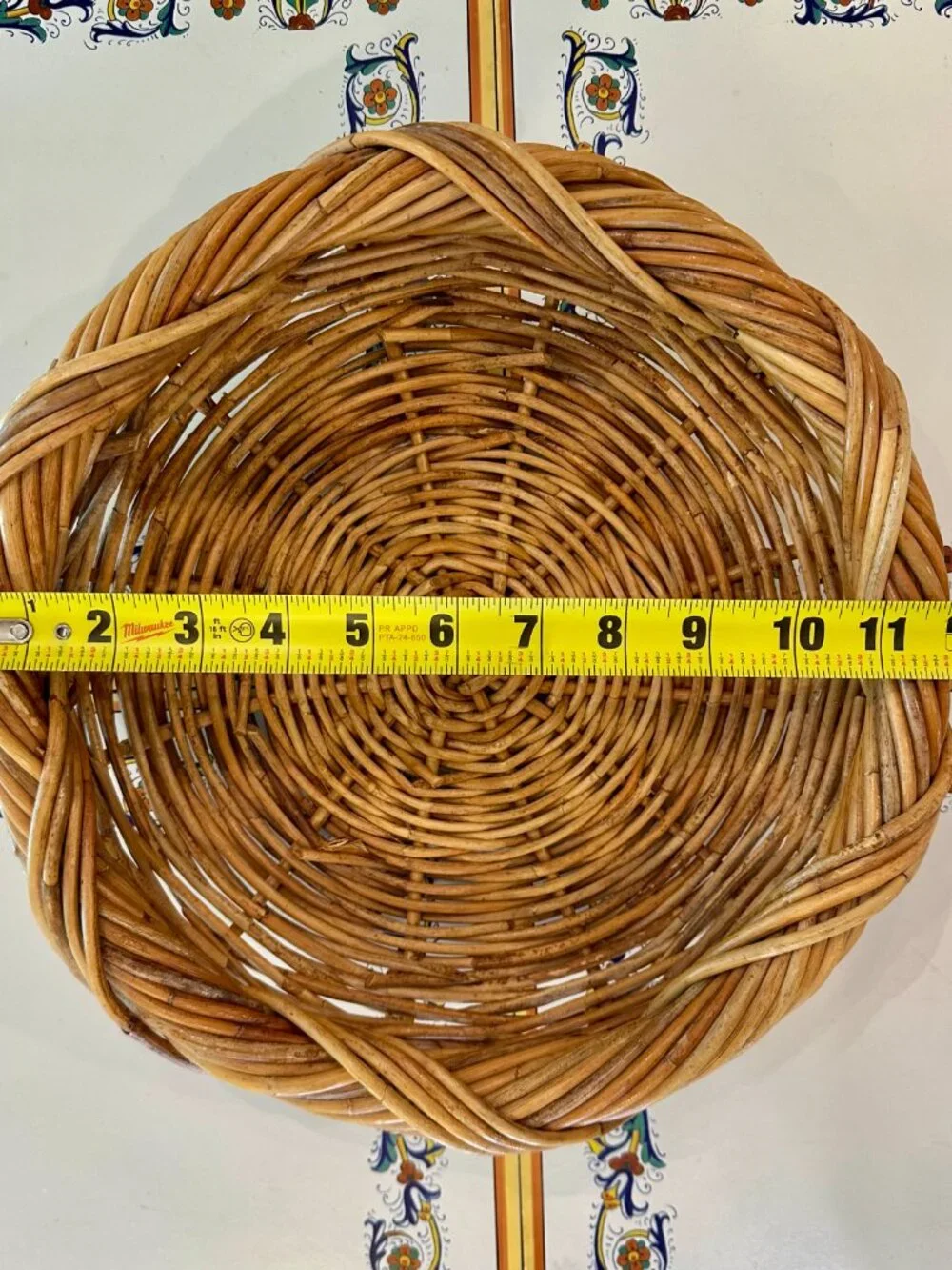 vintage round, hand-woven rattan or wicker basket